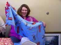 Jennifer with baby blanket from Kathie